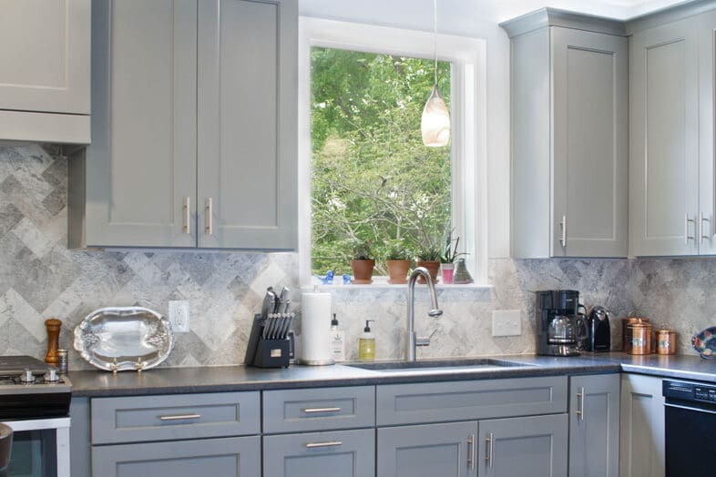 Kitchen remodel with custom cabinetry by Reliant Construction Group