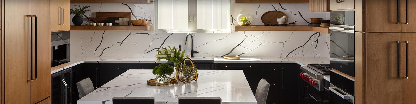 Remodeled Nashville kitchen with custom cabinetry, island seating and pendant lighting